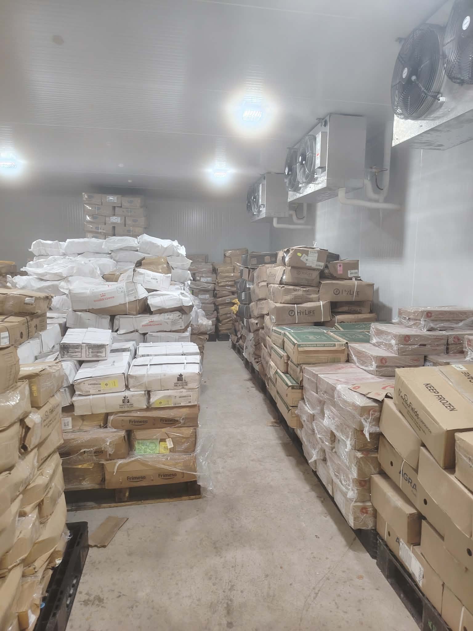 Pallets of stock in the NE Meats cold storage warehouse